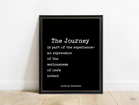 Anthony Bourdain The Journey quote print in a black frame, black background