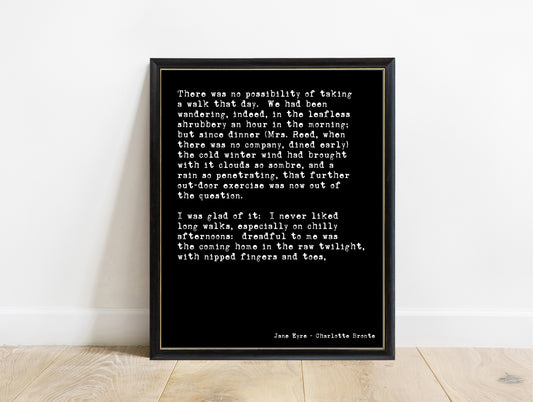 Charlotte Brontë Jane Eyre opening lines print in a black frame, black background