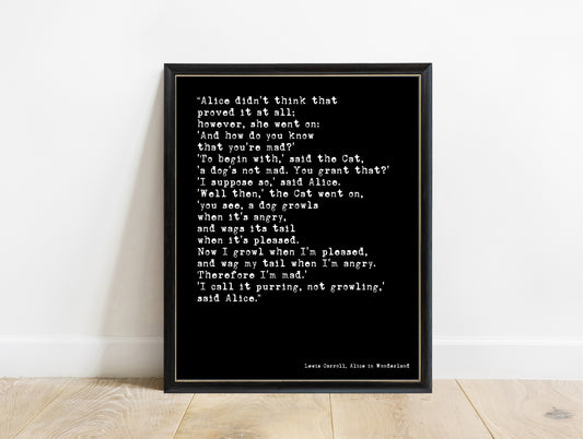 Lewis Carroll I call it purring not growling Cheshire Cat quote print in a black frame, black background