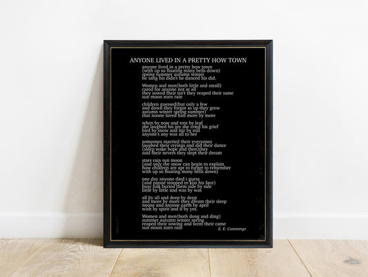 EE Cummings anyone lived in a pretty how town poem print in a black frame, black background