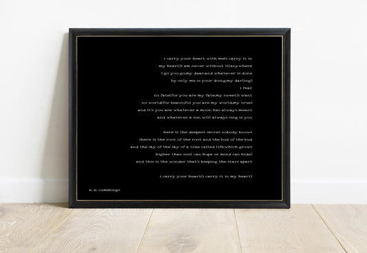 EE Cummings i carry your heart landscape right justified print in a black frame, black background