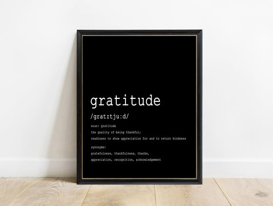 Gratitude dictionary definition typewriter print in a black frame, black background