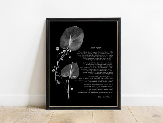 Edgar Guest Don't Quit poem print with watercolour leaves in a black frame, black background