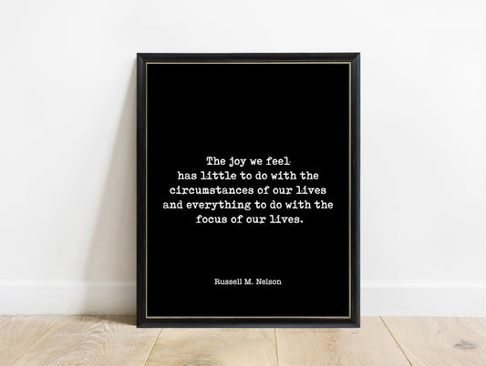 Russell M. Nelson the joy we feel typewriter quote print in a black frame, black background