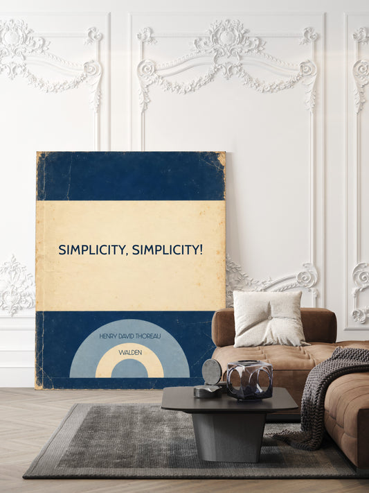 Simplicity, simplicity! Henry David Thoreau Walden quote in a retro navy book cover design, shown unframed in a living room