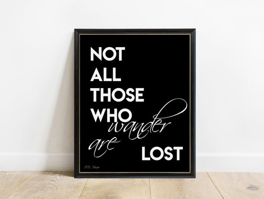 J.R.R. Tolkien not all those who wander are lost bold script print in a black frame, black background