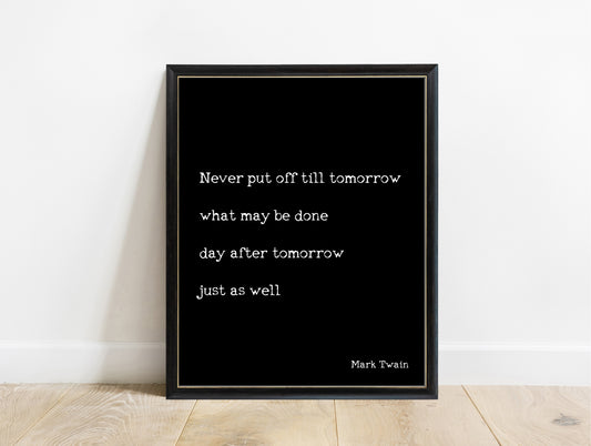 Mark Twain never put off till tomorrow quote print in a black frame, black background