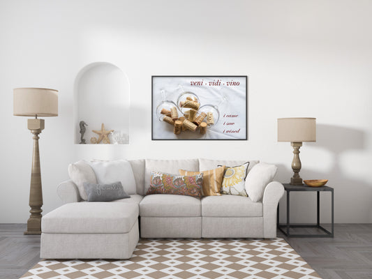 Veni vidi vino, i came i saw i wined, over a photograph of wine glasses and corks, shown framed in a living room