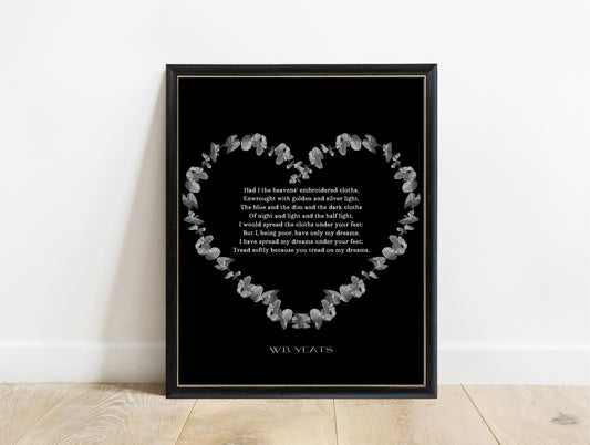 W.B. Yeats He Wishes for the Cloths of Heaven poem print in a botanical heart in a black frame, black background