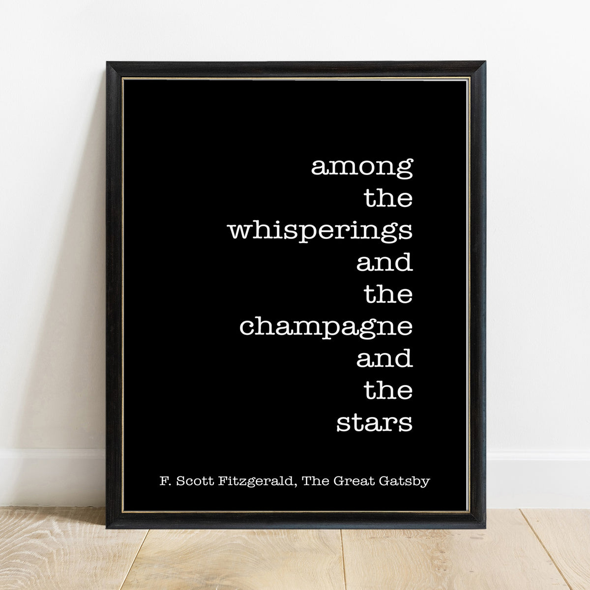 F Scott Fitzgerald among the whisperings and the champagne and the stars print in a black frame, black background