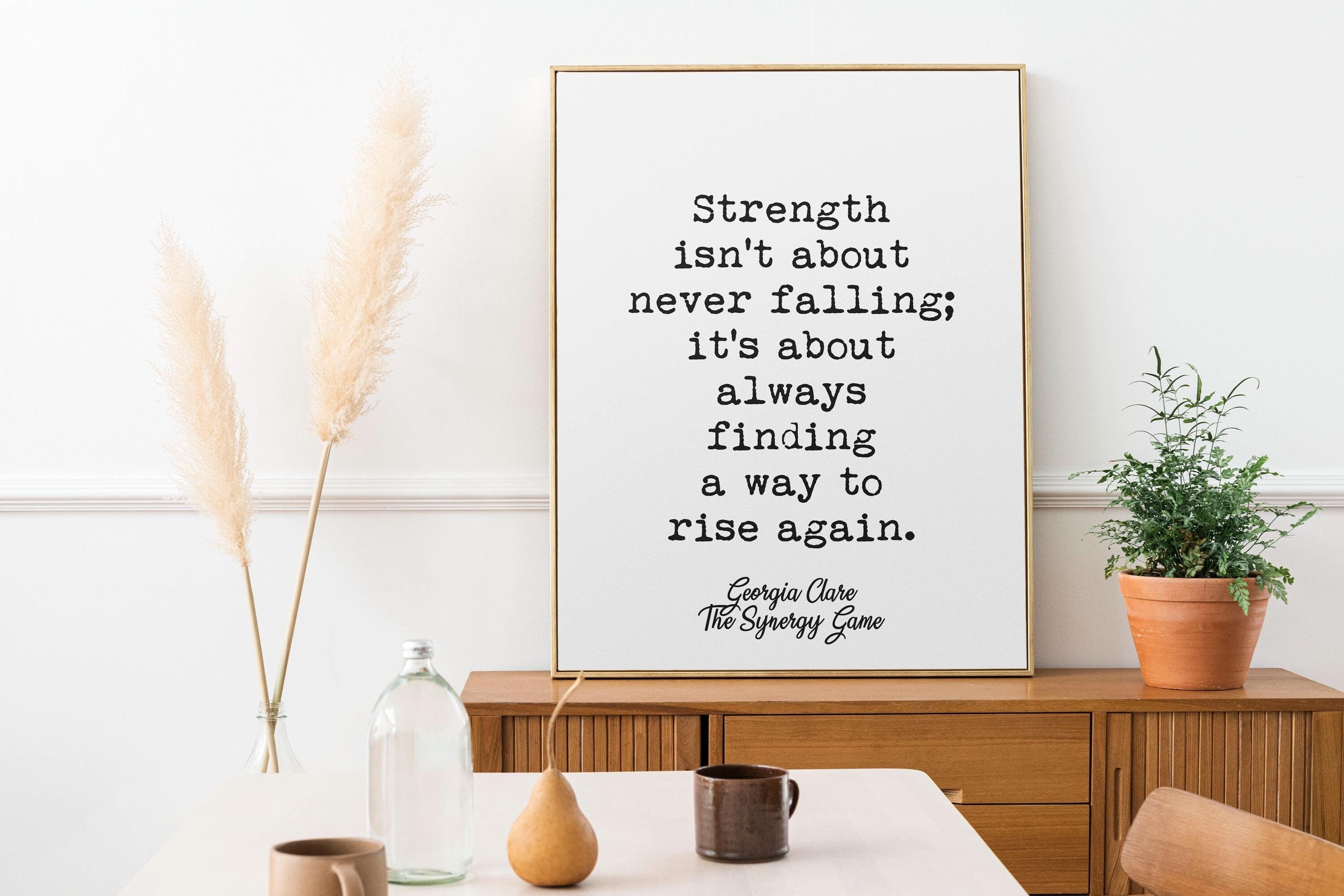 Strength Isn't About Never Falling Quote by Georgia Clare from The Synergy Game - Motivational Wall Art - Minimalist Typography Decor
