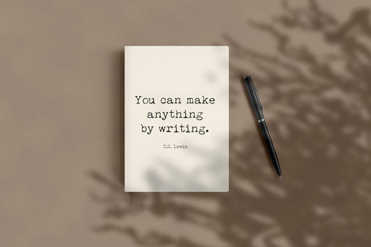 C.S. Lewis You can make anything by writing journal lying flat beside a black pen