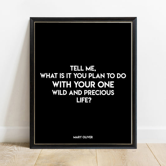 Mary Oliver one wild and precious life quote print in bold modern capitals in a black frame, black background