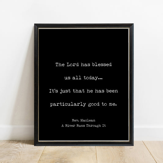 A River Runs Through It The Lord Has Blessed Us All Today print in a black frame, black background