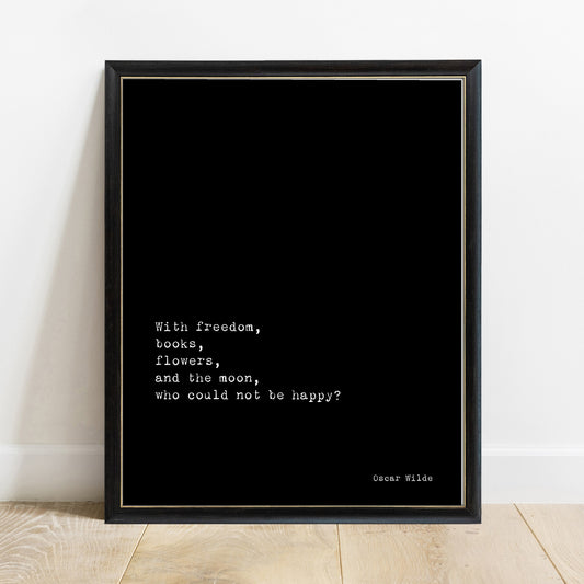 Oscar Wilde with freedom, books, flowers and the moon quote print in a black frame, black background