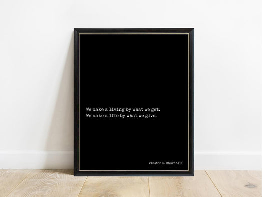 Winston Churchill We Make A Life By What We Give print in a black frame, black background