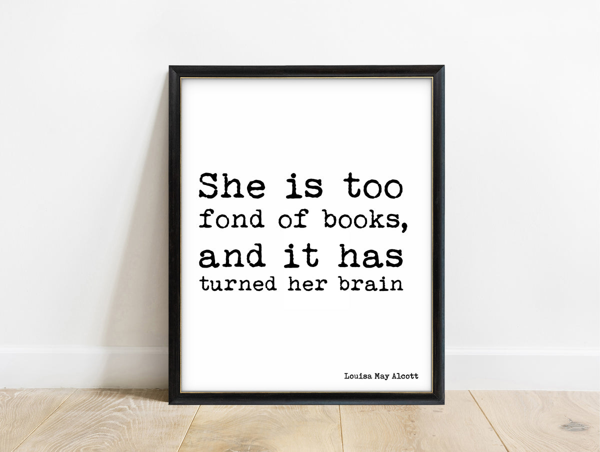 Louisa May Alcott too fond of books bold typewriter quote print in a black frame, white background