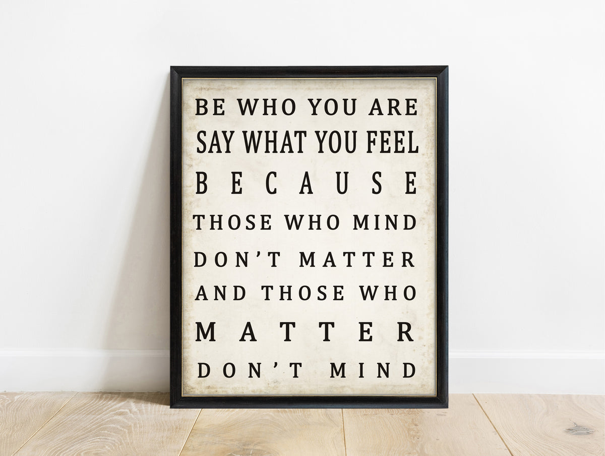 Be who you are and say what you feel bold typography print in a black frame, vintage background