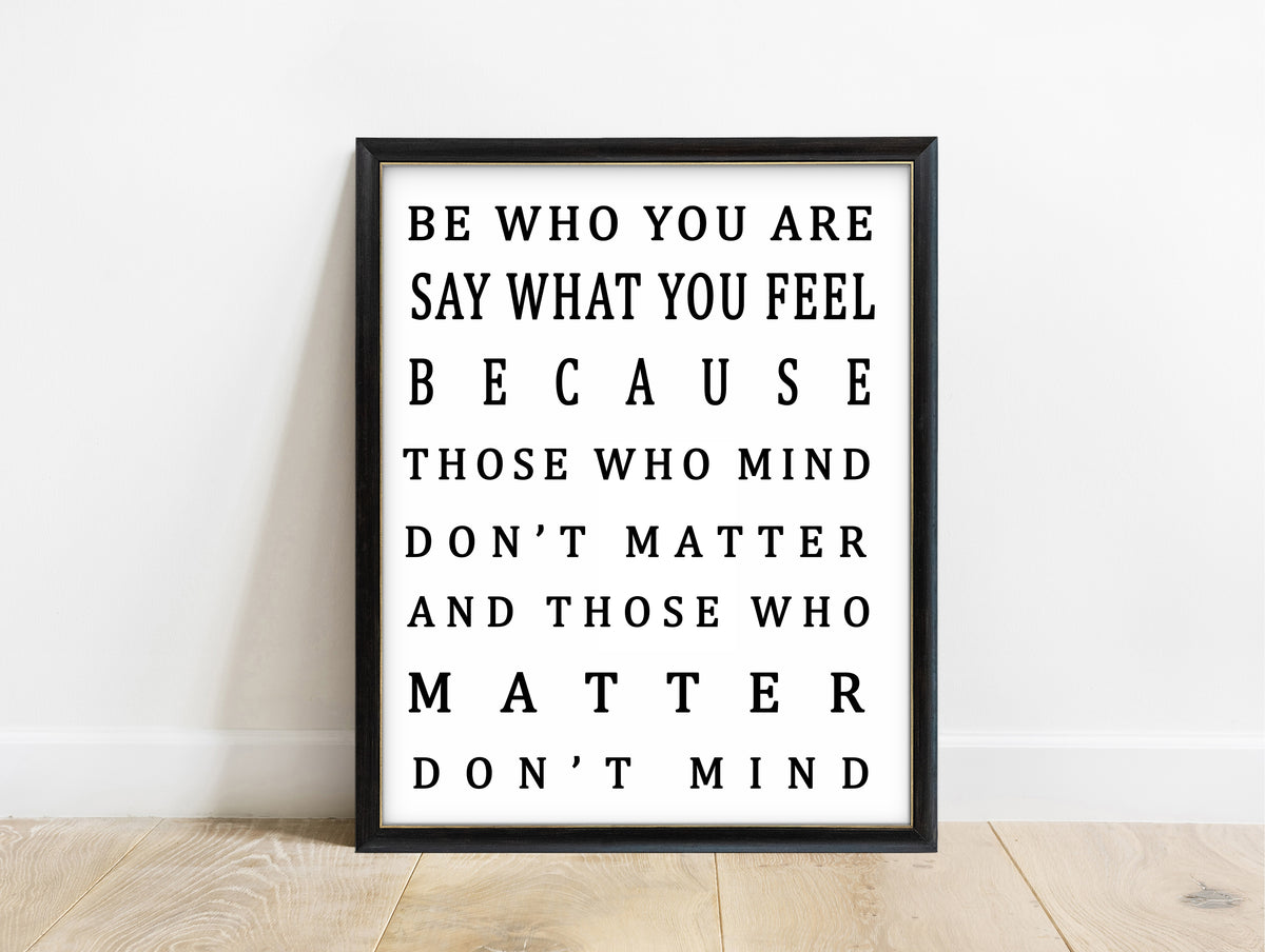 Be who you are and say what you feel bold typography print in a black frame, white background