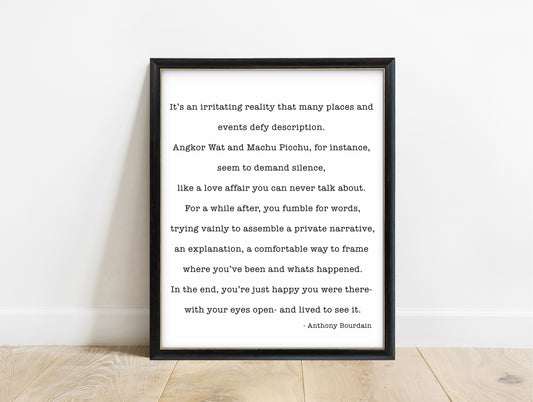 Anthony Bourdain places that defy description quote print in a black frame, white background