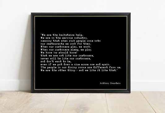 Anthony Bourdain we are the backstairs help quote print in a black frame, black background