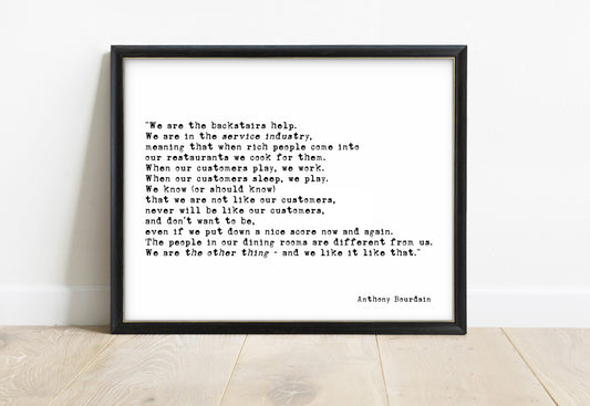 Anthony Bourdain we are the backstairs help quote print in a black frame, white background