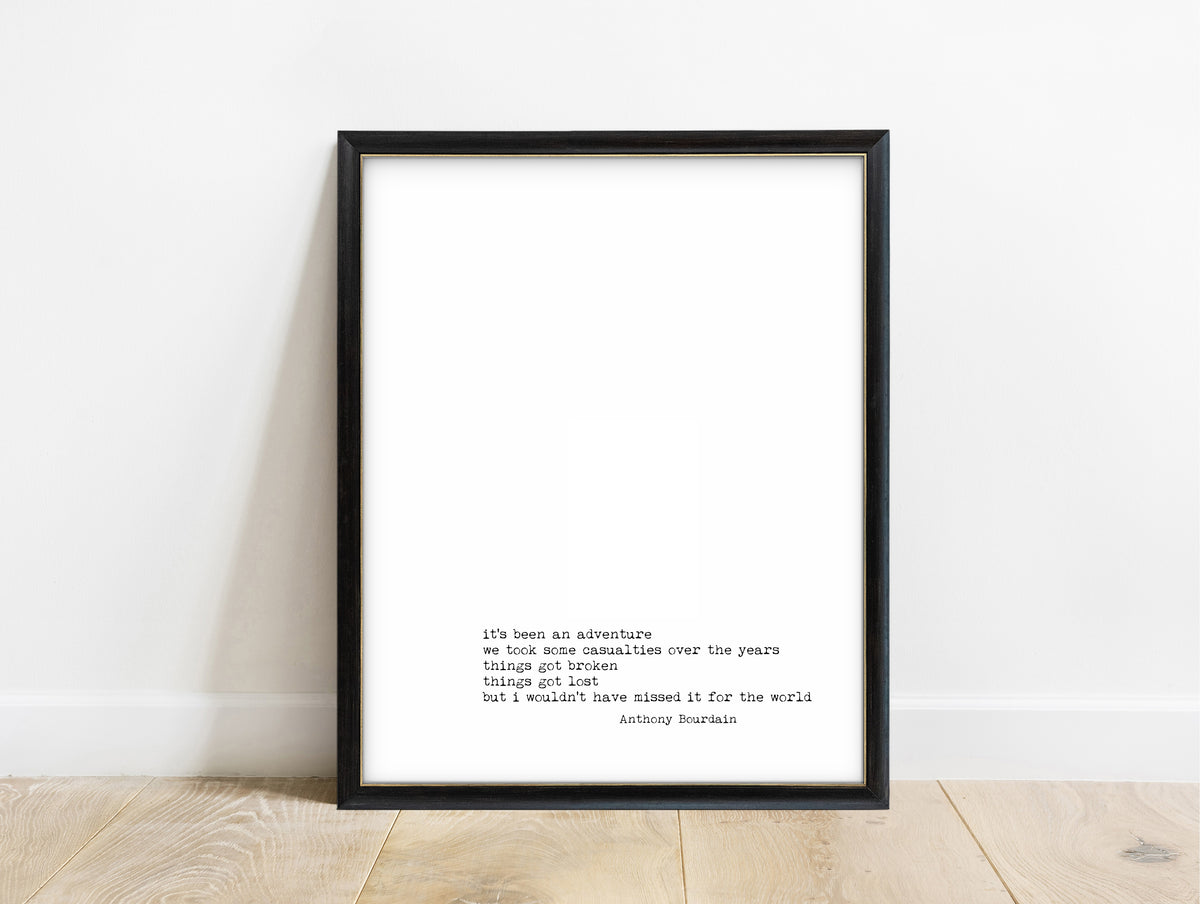 Anthony Bourdain it's been an adventure quote print in a black frame, white background