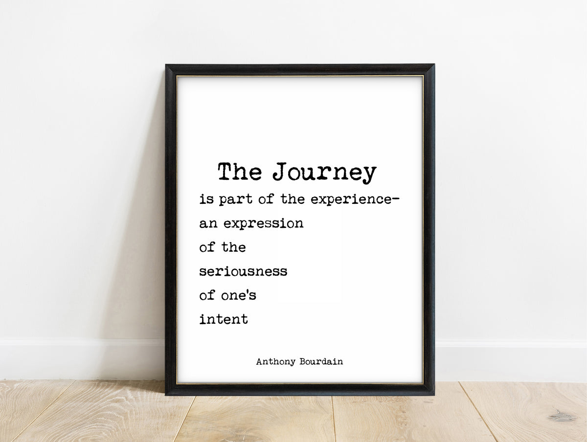 Anthony Bourdain The Journey quote print in a black frame, white background