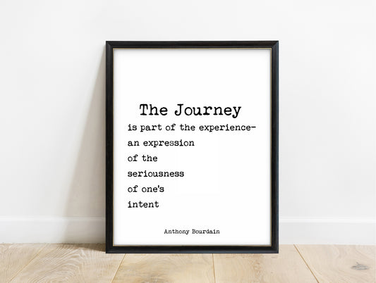 Anthony Bourdain The Journey quote print in a black frame, white background