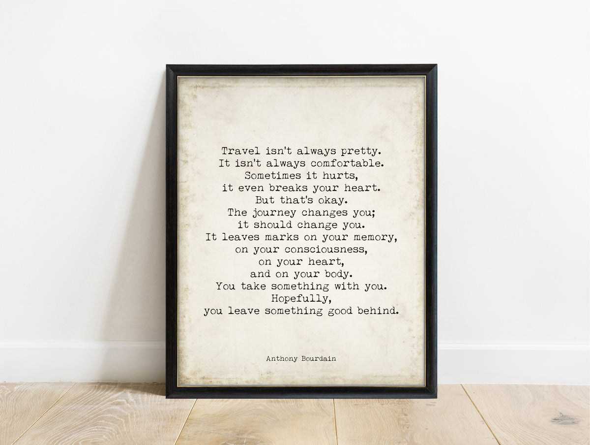 Anthony Bourdain travel isn't always pretty quote print in a black frame, vintage background
