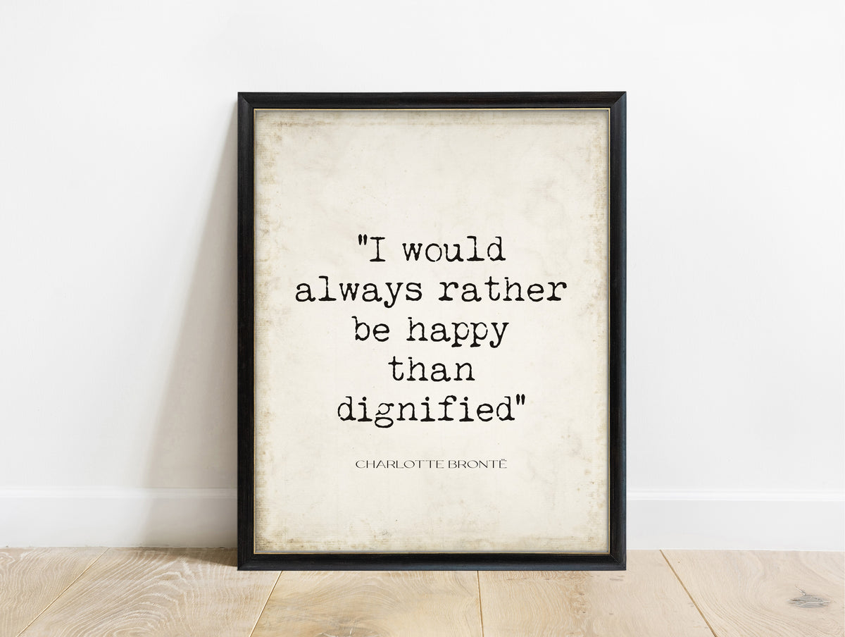 Charlotte Brontë rather be happy than dignified quote print in a black frame, vintage background