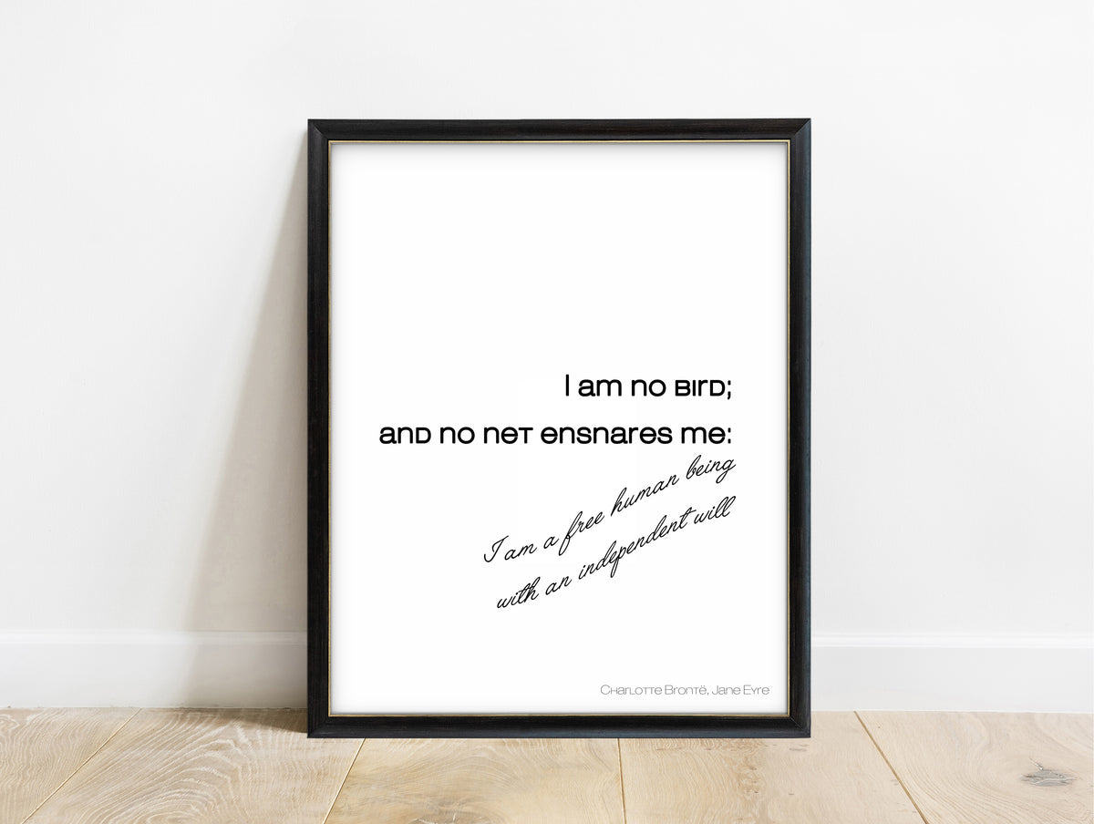 Charlotte Brontë I am no bird script quote print in a black frame, white background