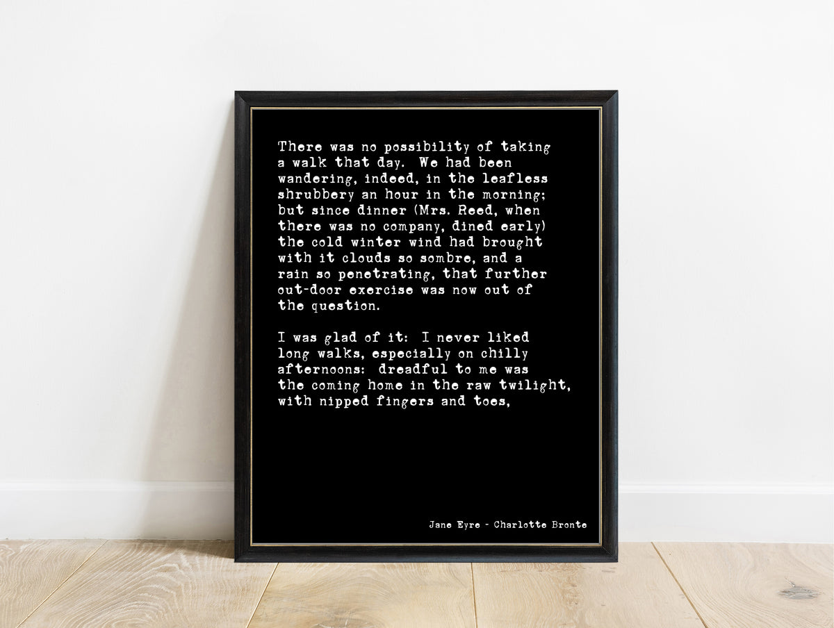 Charlotte Brontë Jane Eyre opening lines print in a black frame, black background