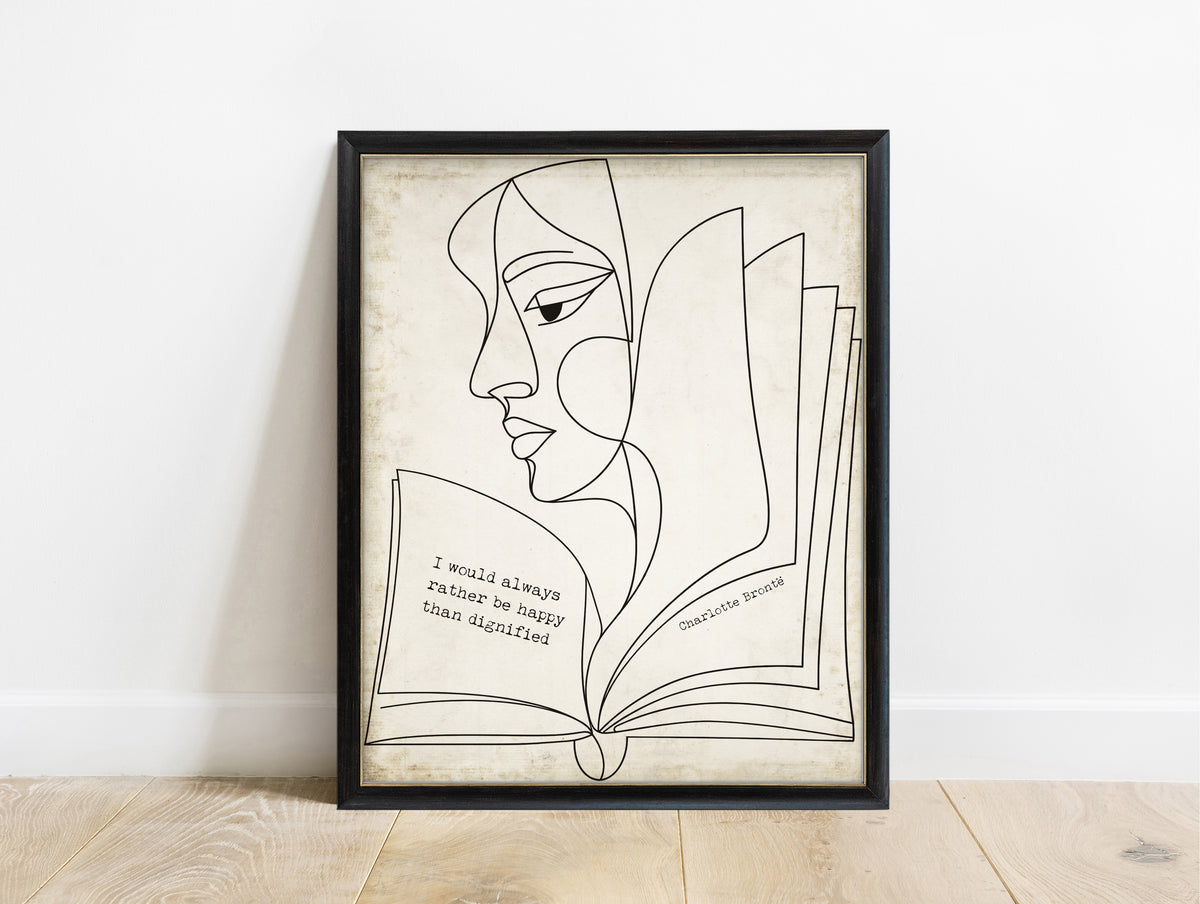 Charlotte Brontë I would always rather be happy than dignified quote on an open book with a face, line art, in a black frame, vintage background