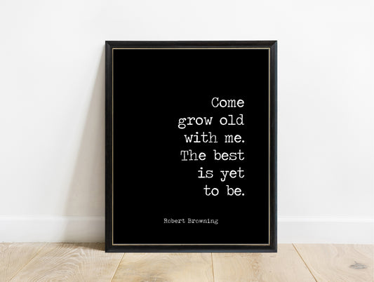 Robert Browning grow old with me the best is yet to be typewriter print in a black frame, black background