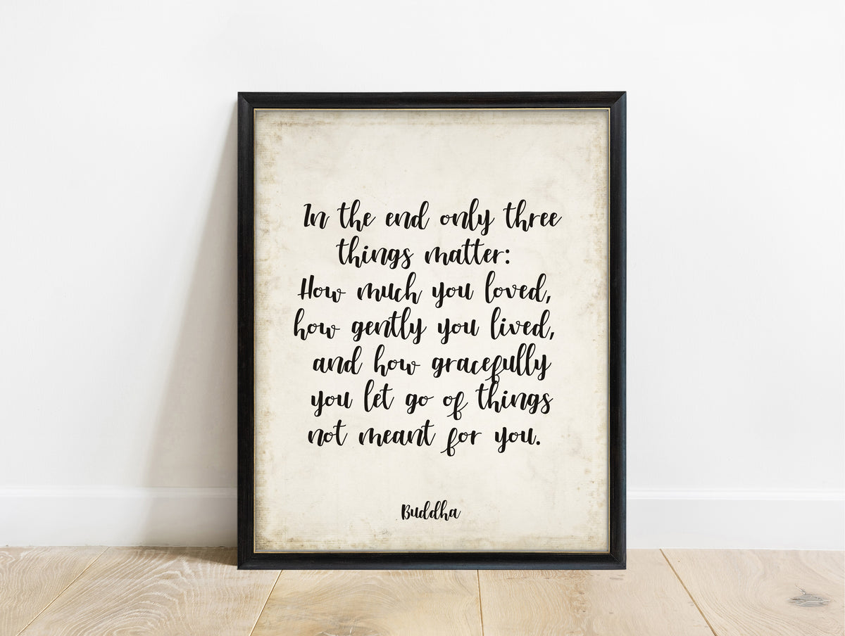 Buddha in the end only three things matter script quote print in a black frame, vintage background
