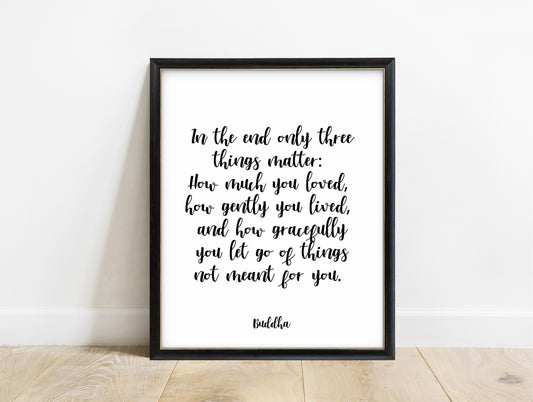 Buddha in the end only three things matter script quote print in a black frame, white background