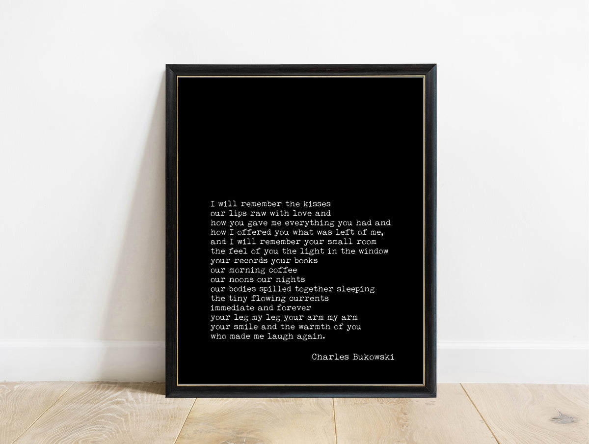 Charles Bukowski I Will Remember the Kisses poem print in a black frame, black background