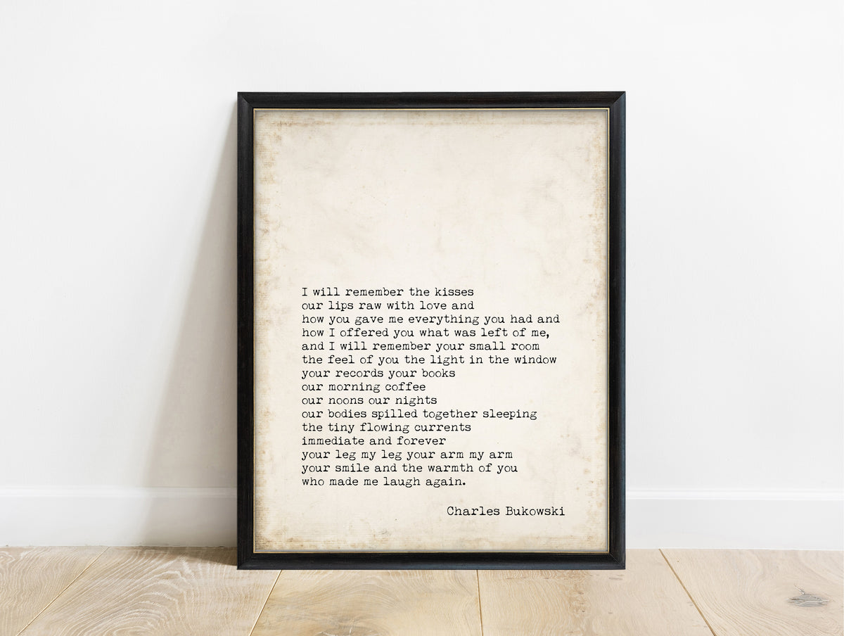 Charles Bukowski I Will Remember the Kisses poem print in a black frame, vintage background