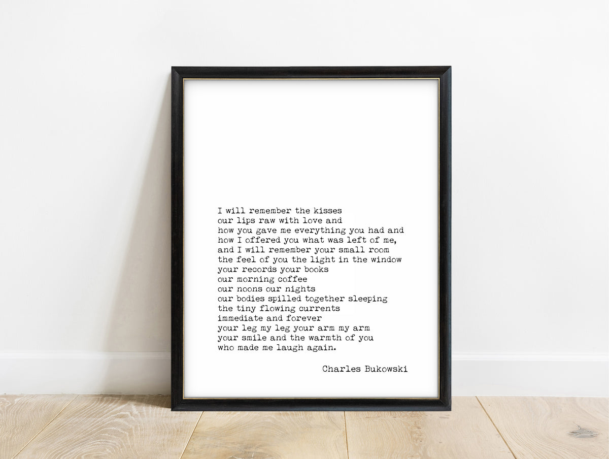 Charles Bukowski I Will Remember the Kisses poem print in a black frame, white background