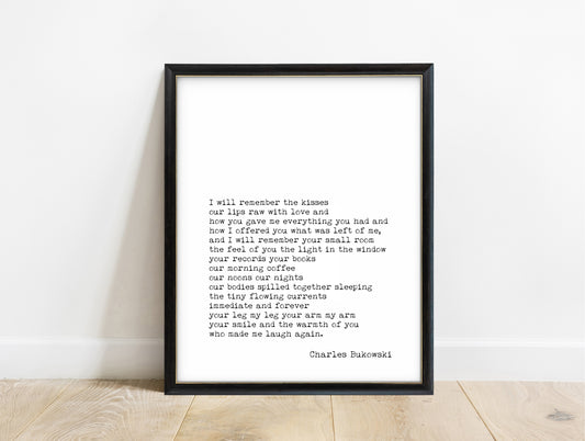 Charles Bukowski I Will Remember the Kisses poem print in a black frame, white background