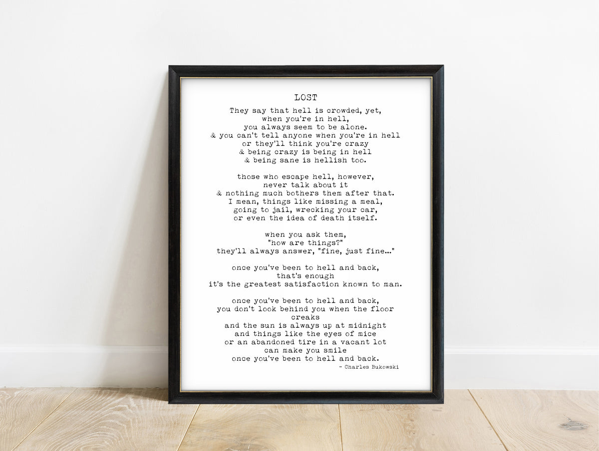 Charles Bukowski Lost poem print in a black frame, white background