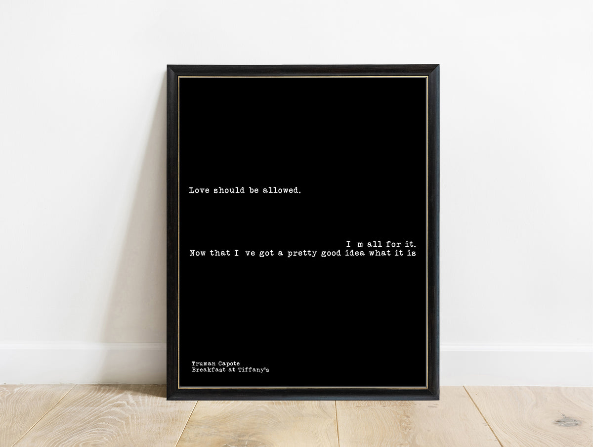 Truman Capote love should be allowed typewriter print in a black frame, black background