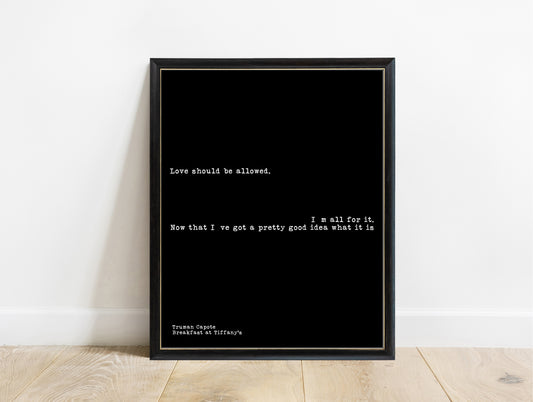 Truman Capote love should be allowed typewriter print in a black frame, black background