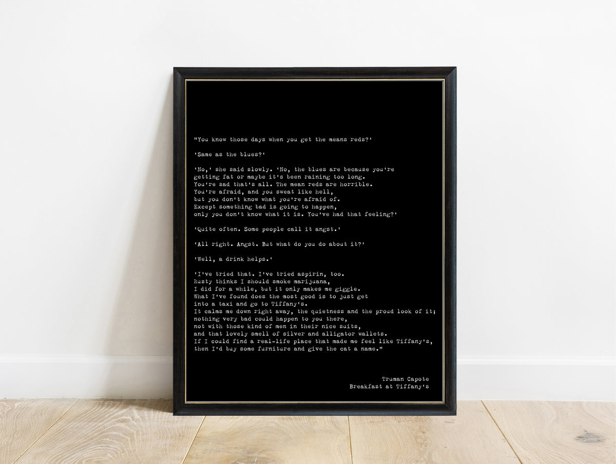 Truman Capote the mean reds typewriter print in a black frame, black background