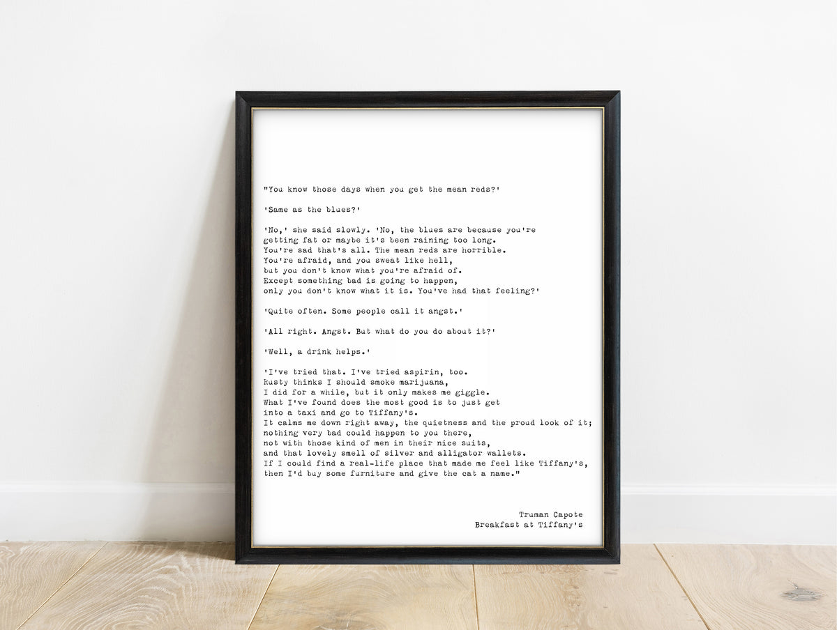 Truman Capote the mean reds typewriter print in a black frame, white background