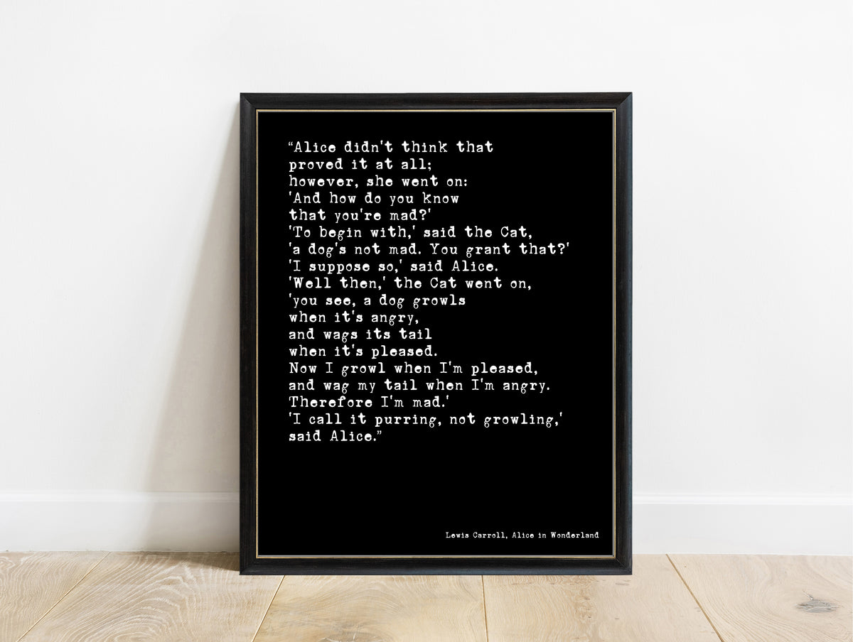 Lewis Carroll I call it purring not growling Cheshire Cat quote print in a black frame, black background