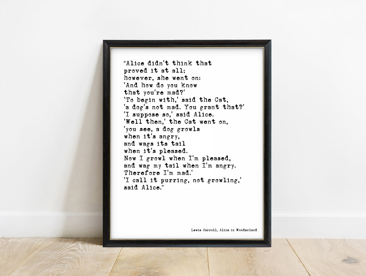 Lewis Carroll I call it purring not growling Cheshire Cat quote print in a black frame, white background