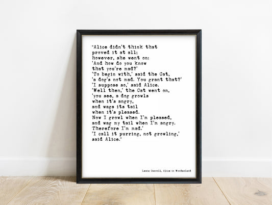Lewis Carroll I call it purring not growling Cheshire Cat quote print in a black frame, white background