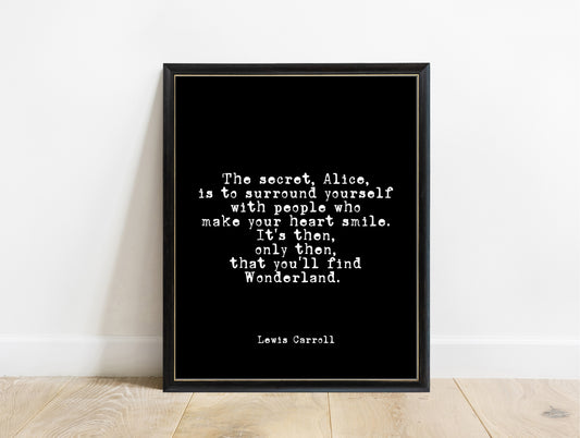 Lewis Carroll the secret Alice heart smile quote print in a black frame, black background